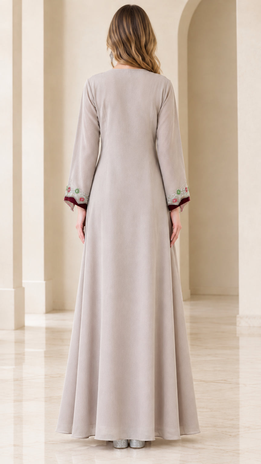 Back view of beige flowing full-length kaftan dress