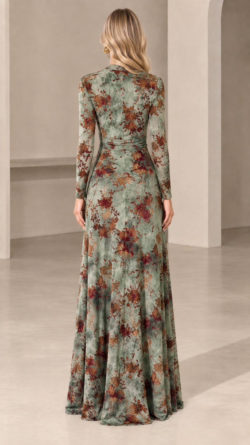 Back view of woman wearing sage green floral long sleeve maxi dress