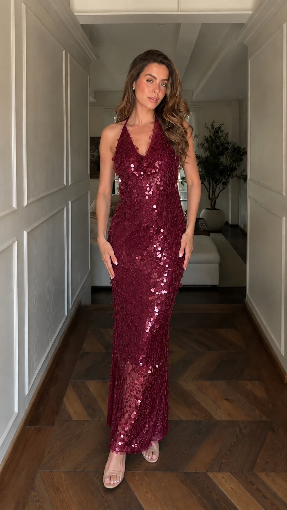 Front view of burgundy sequin halter maxi dress