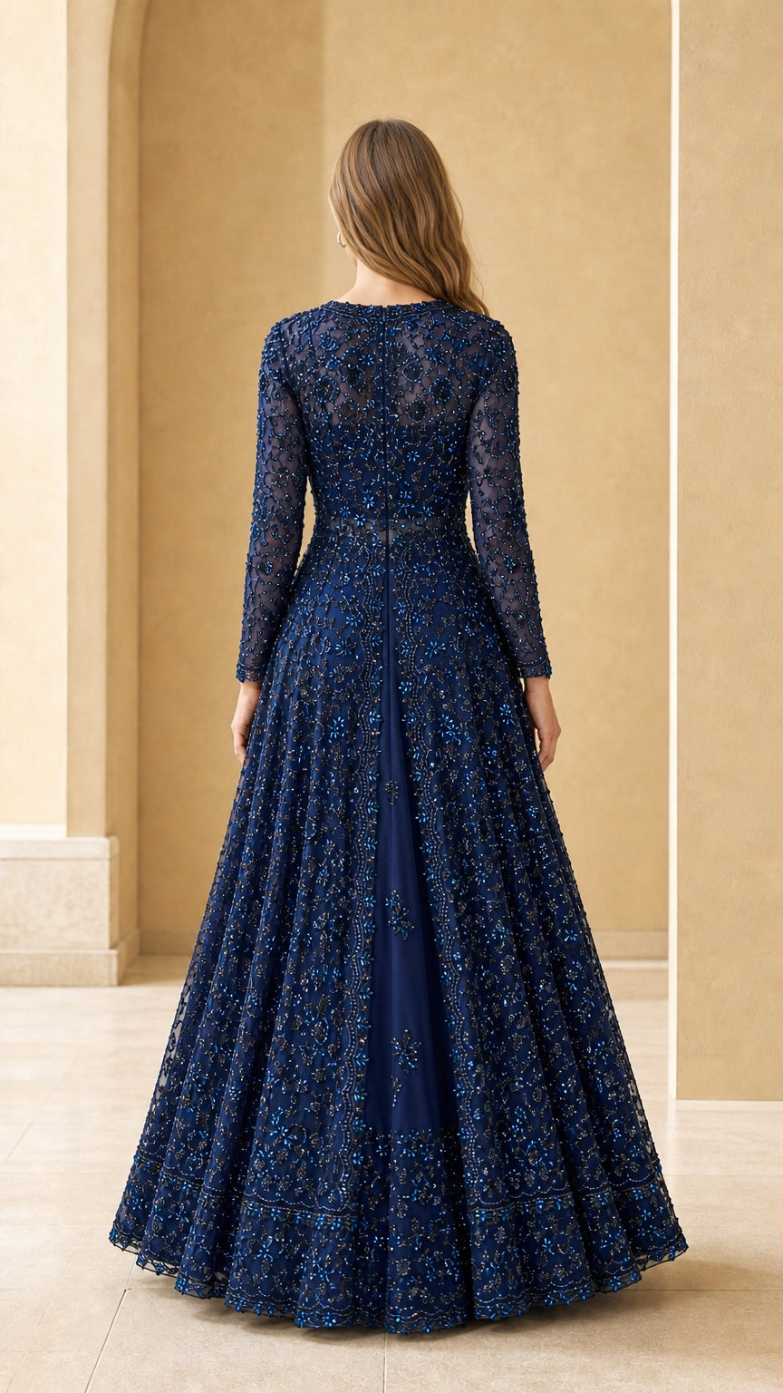 Navy blue sequined formal gown back view showing fitted bodice and full skirt