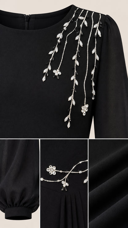 Close-up details of sparkling crystal floral embellishment and pleated chiffon fabric