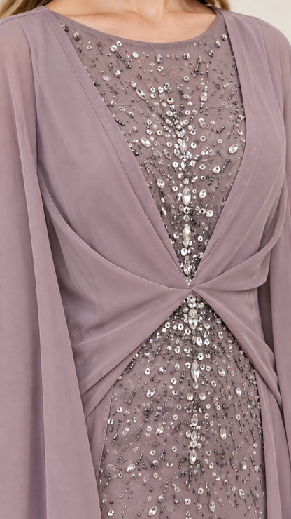 Close-up detail of sparkling sequin beadwork and twist-front bodice