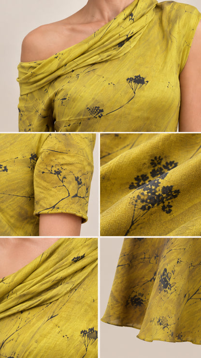 Close-up details of draped neckline, fabric texture, and floral print on maxi dress