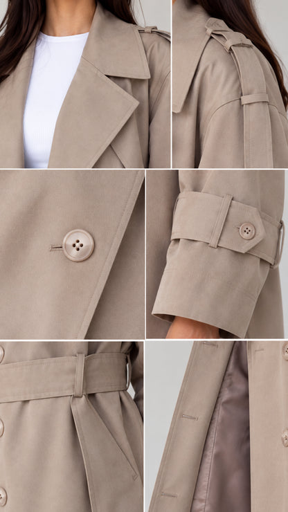 Close-up details of trench coat notch lapel, shoulder tabs, tonal buttons, and cuff strap