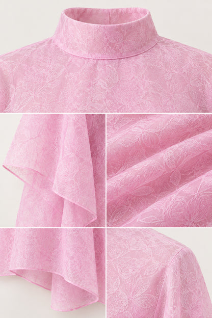 Close-up details of mock neck collar, tonal jacquard texture, and flowing hemline