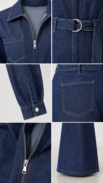 Close-up details of dark blue denim jumpsuit collar, zipper, belt, and cuff