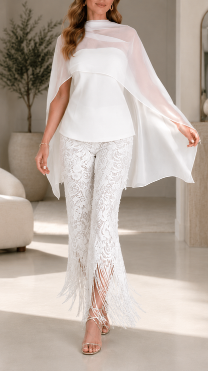 Close front view of white dressy pants set with draped sheer overlay