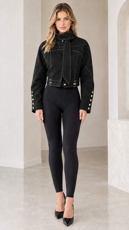 Front full view of Black cropped high-neck jacket with white contrast topstitching