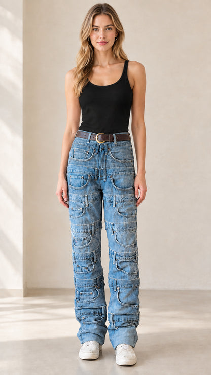 Front view of model wearing denim blue multi-pocket jeans styled with black tank top