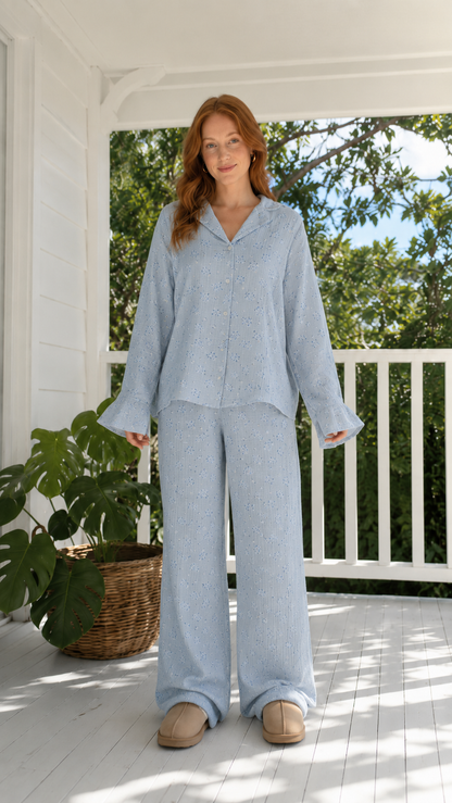 Front view of powder blue floral lounge set with relaxed fit top and pants