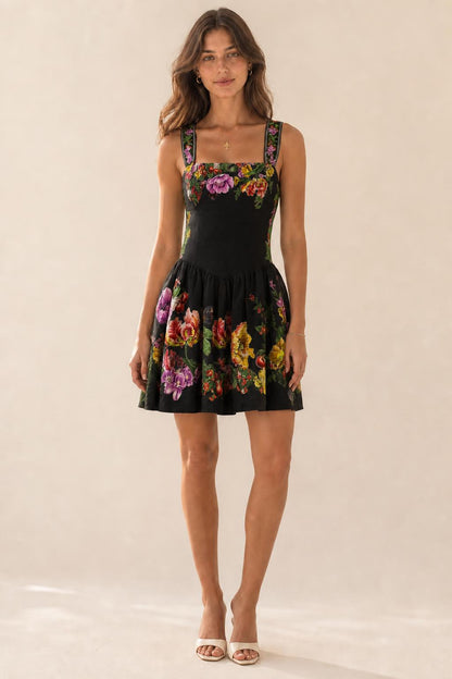 Front view of black botanical print mini dress variant