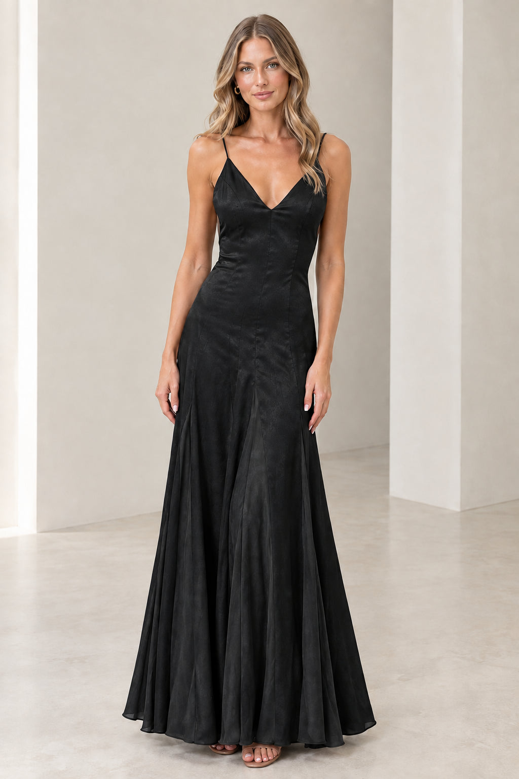 Front view of model wearing Black satin V-neck evening maxi dress