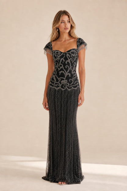 Front view of the black beaded evening gown