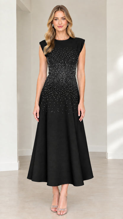 Front view of black rhinestone embellished cap sleeve midi formal dress