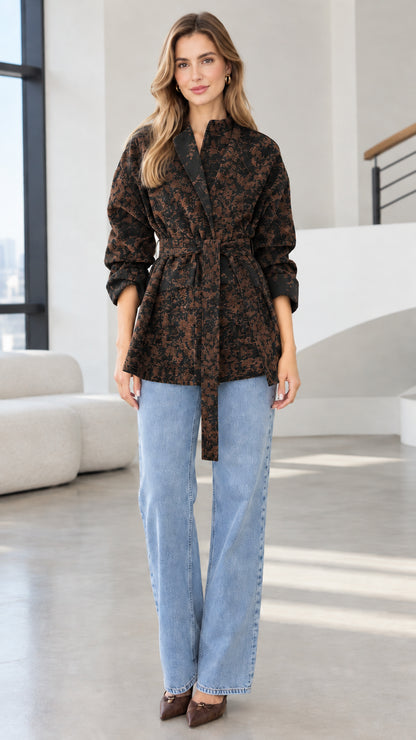 Model wearing charcoal black floral jacquard belted wrap jacket