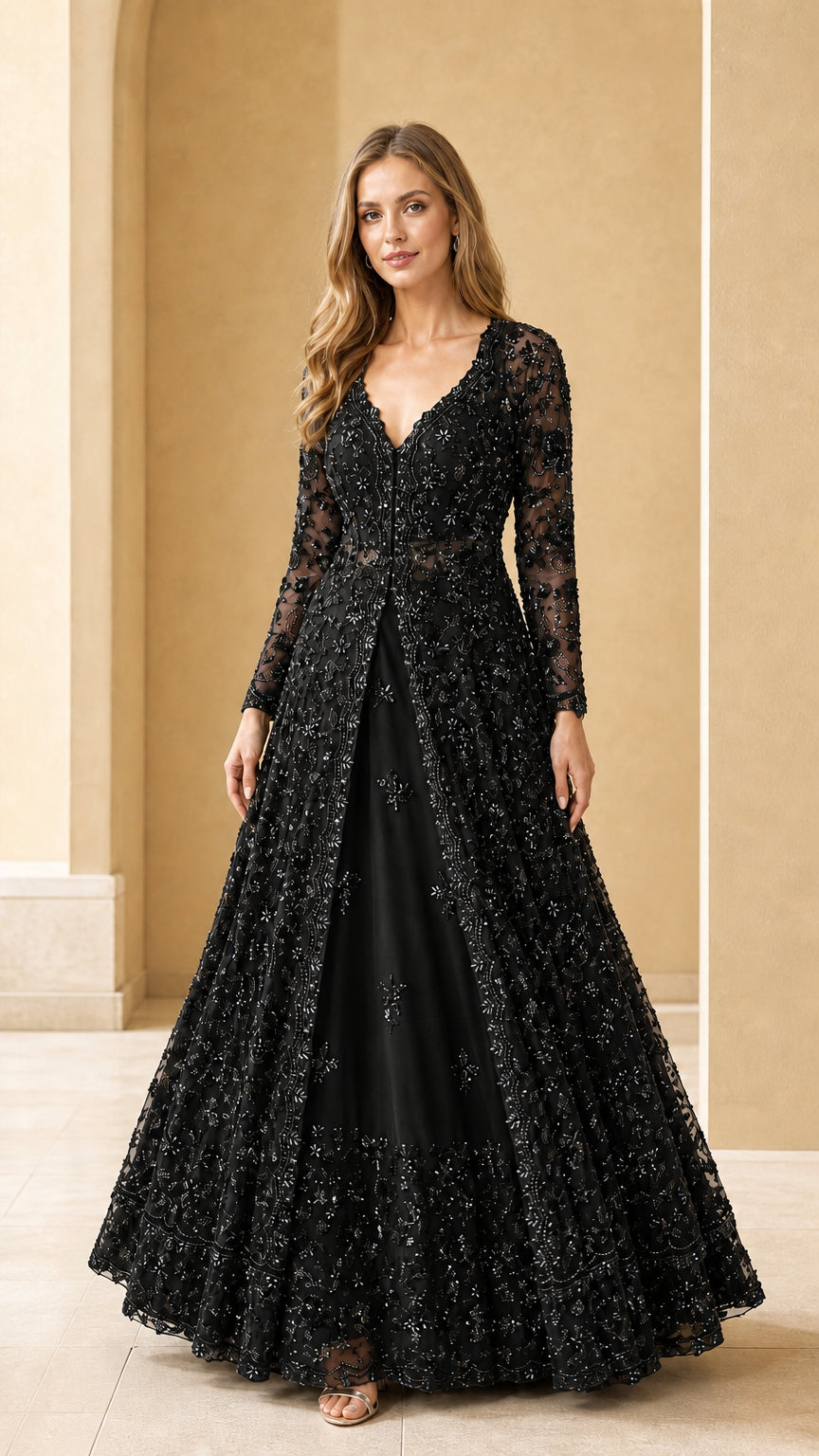 Black long sleeve beaded evening gown with front open overlay