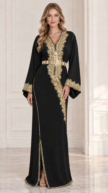 Front view of model wearing black Moroccan kaftan dress with gold embroidery and belt