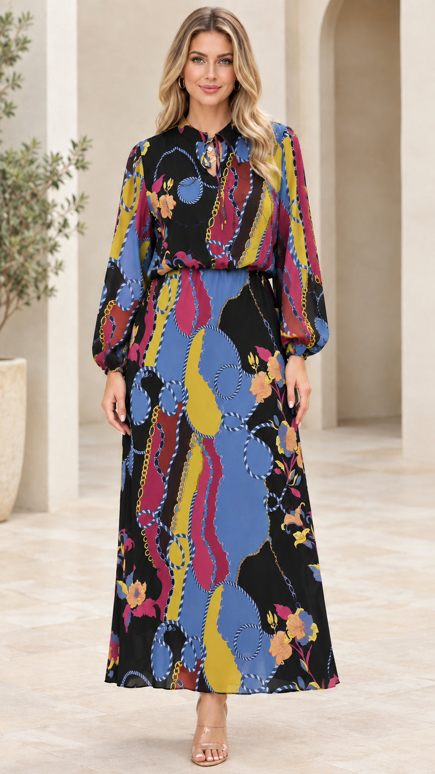 Front view of Black chain and floral print long sleeve maxi dress