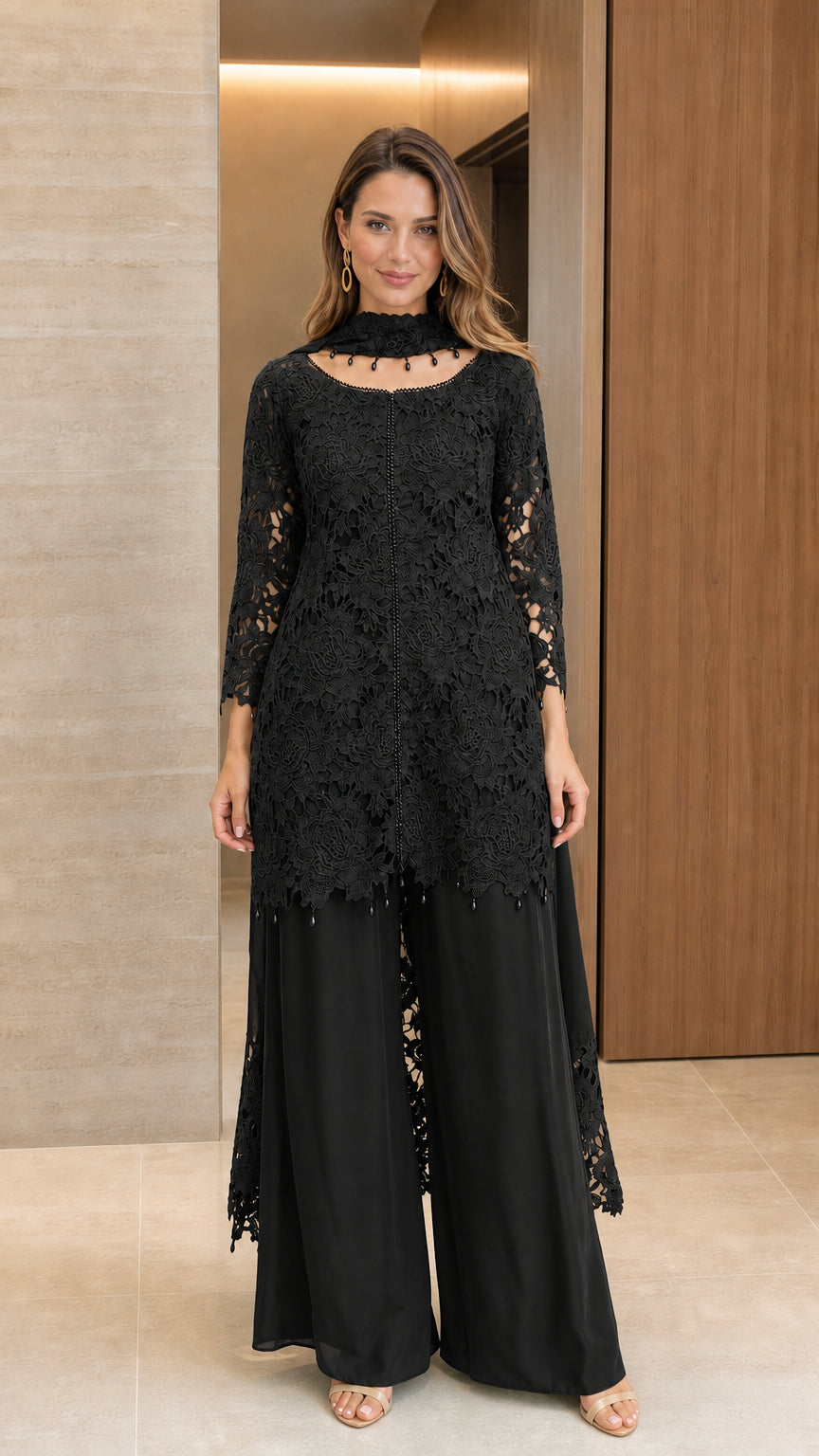 Front view of black floral lace tunic and wide-leg pant two-piece set