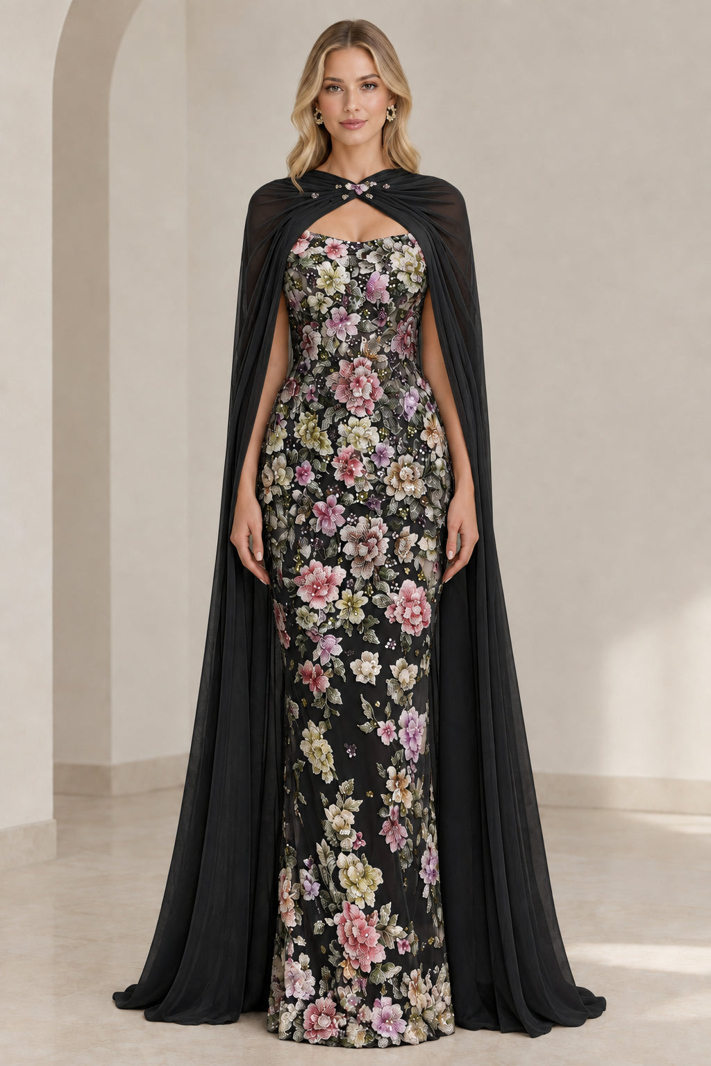 Black floral embroidered formal evening gown with sheer black floor-length cape