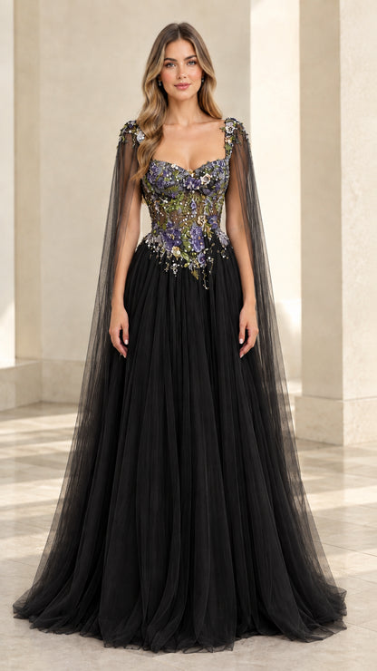 Black sweetheart tulle evening gown with colorful floral embroidery and shoulder capes