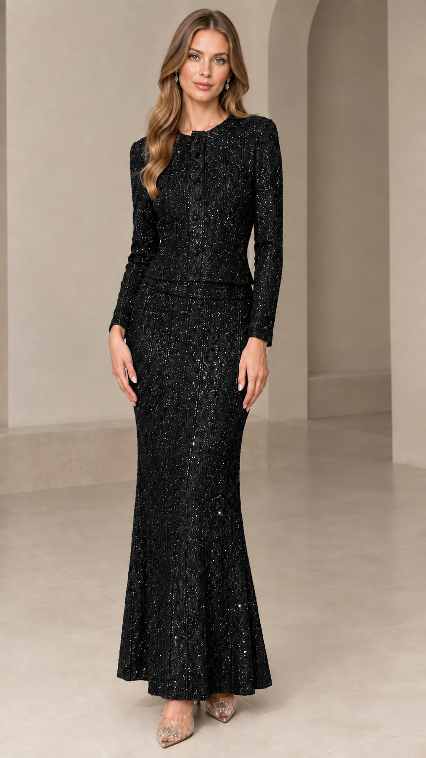 Front view of model wearing Black sequin long sleeve jacket and matching maxi skirt set