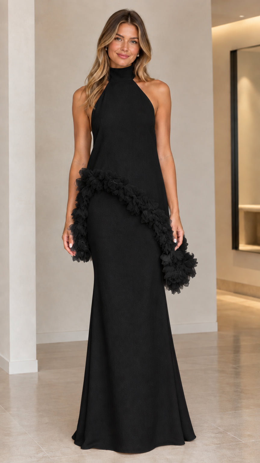 Front view of black halter high-neck column maxi dress with tonal 3D ruffle trim