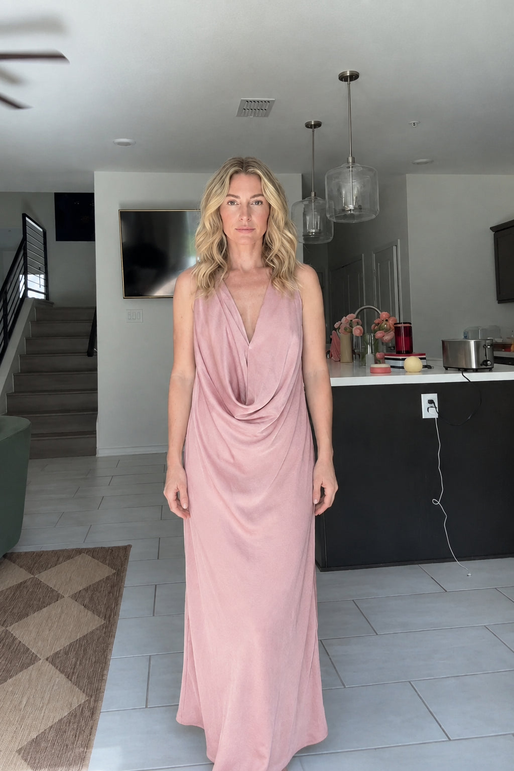 Front view of woman wearing Dusty Pink draped cowl neck maxi dress