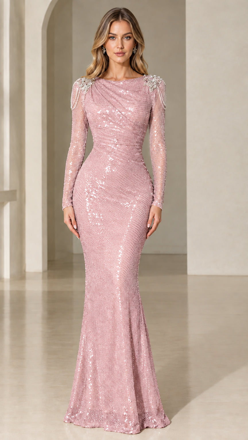 Model wearing blush pink sequin mermaid evening dress with long sleeves
