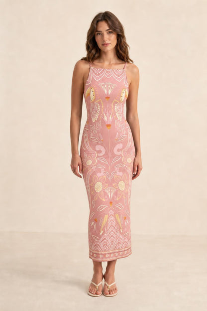 Full length front view of model wearing Pink printed midi dress
