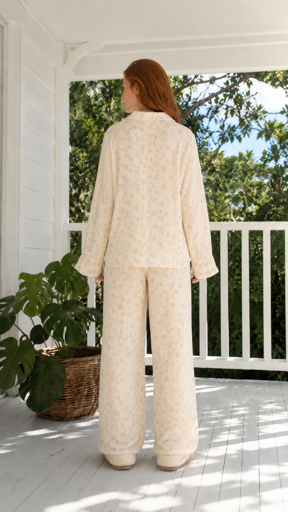 Back view of cream floral lounge set showing full-length wide leg silhouette