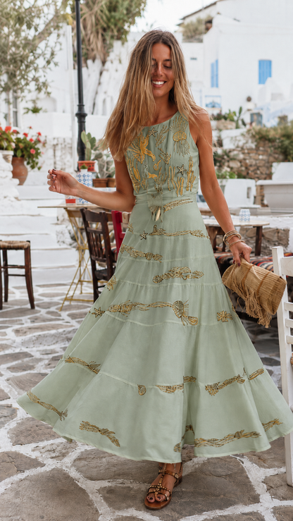 Front view of sage sleeveless embroidered tiered maxi dress with soft flowy silhouette