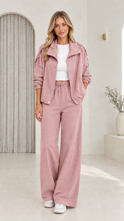 Front view of model wearing dusty pink matching utility pant set
