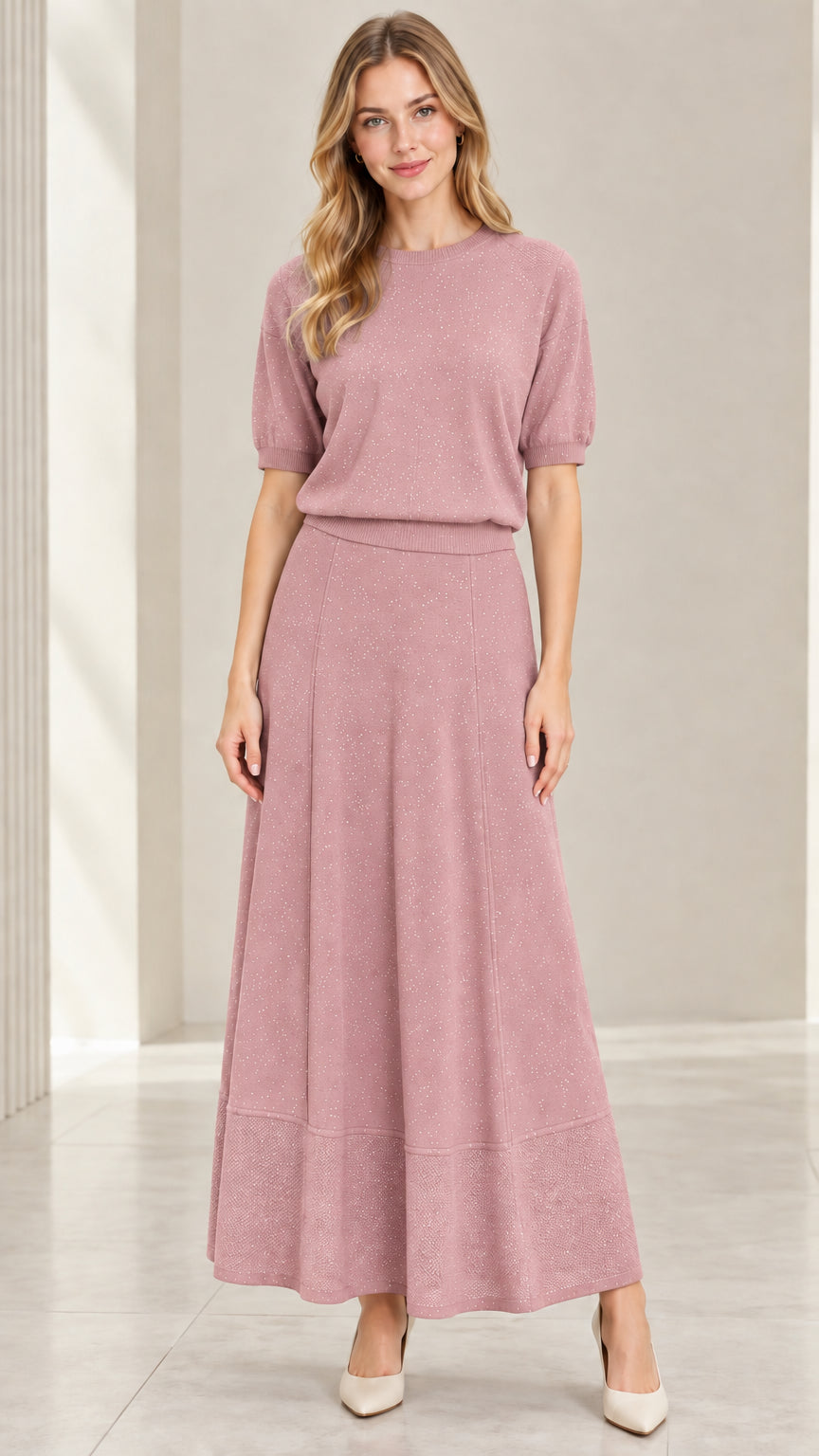 Model wearing dusty rose pink sparkle knit top and A-line maxi skirt set