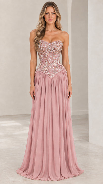 Front view of dusty rose pink strapless beaded corset formal evening gown