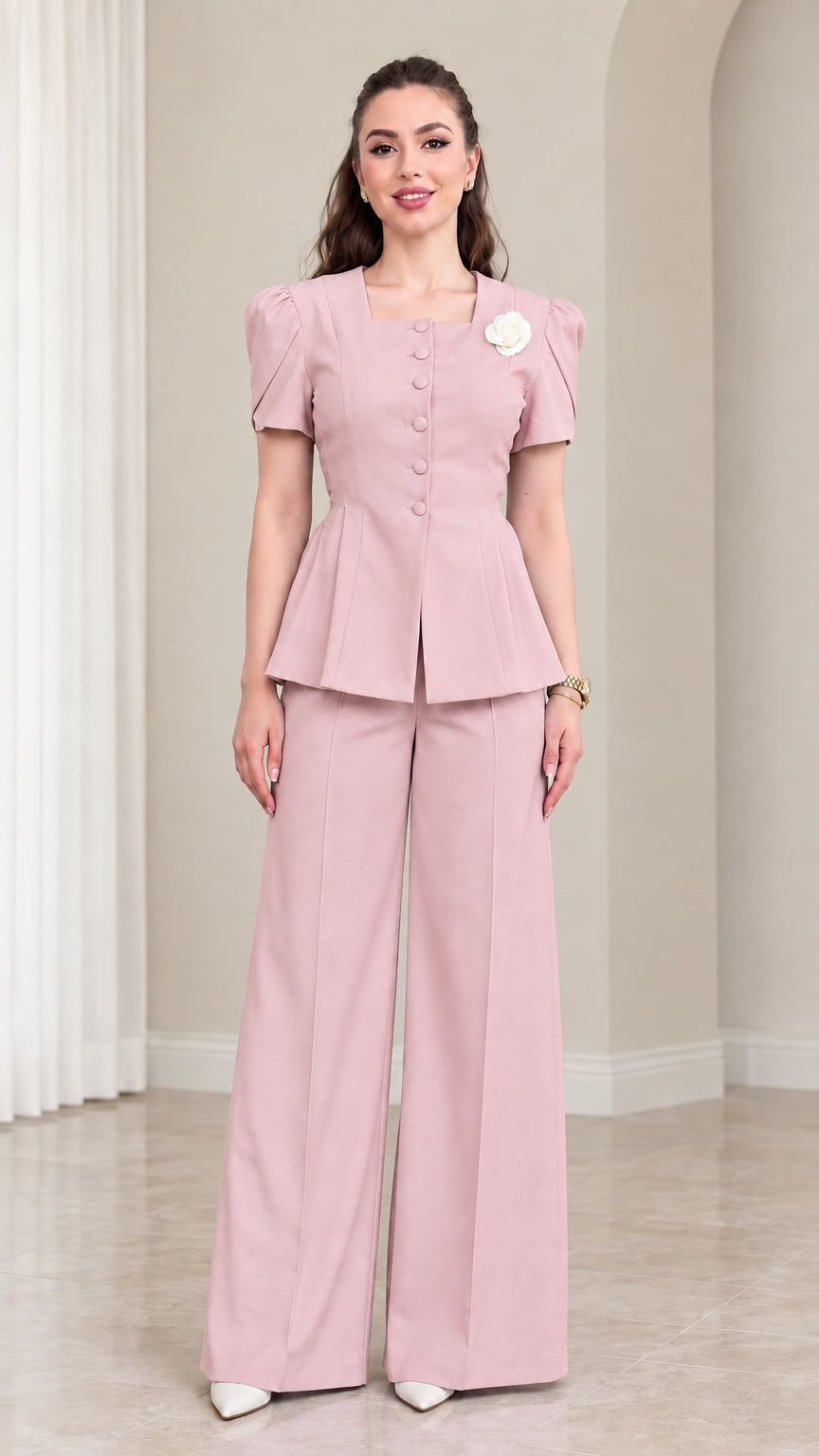 Model wearing Dusty Pink short sleeve peplum jacket and wide leg pants