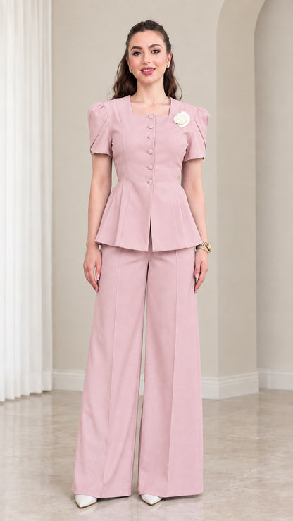 Model wearing Dusty Pink short sleeve peplum jacket and wide leg pants