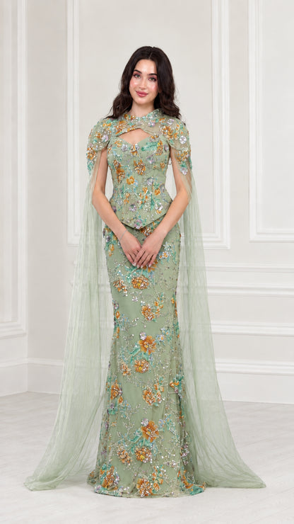 Front view of Sage Green floral embroidered evening gown with sheer green cape