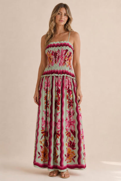 Front view of floral print smocked maxi dress in sage
