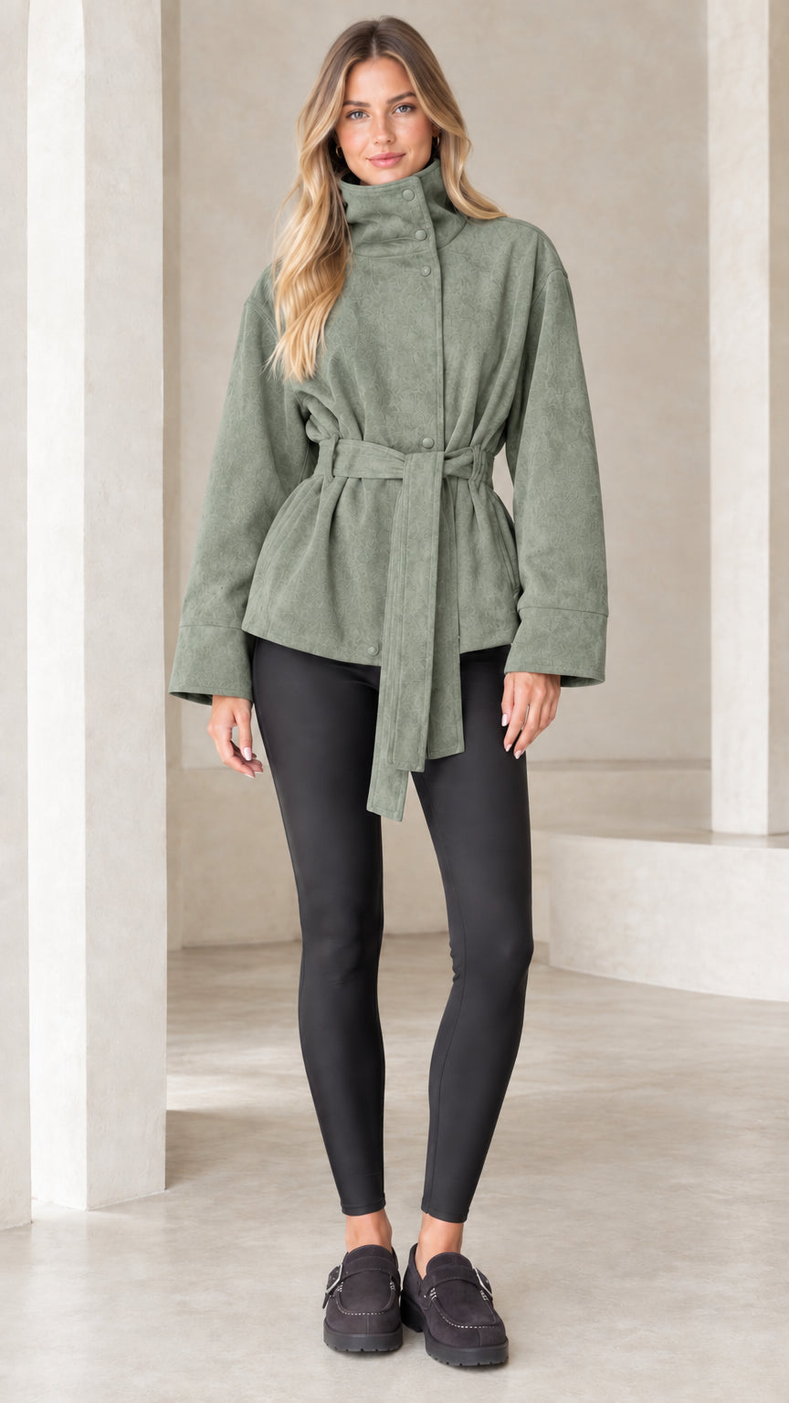 Model wearing sage green high-neck belted faux suede jacket
