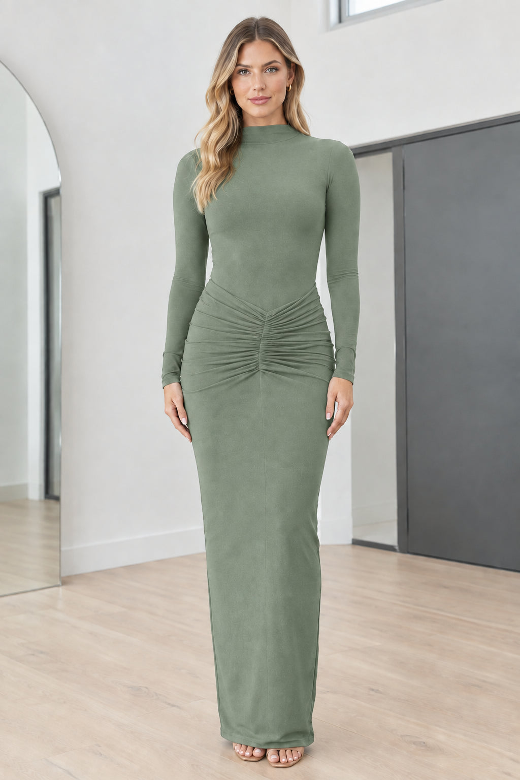 Full front view of model wearing Sage Green mock neck long sleeve ruched maxi dress