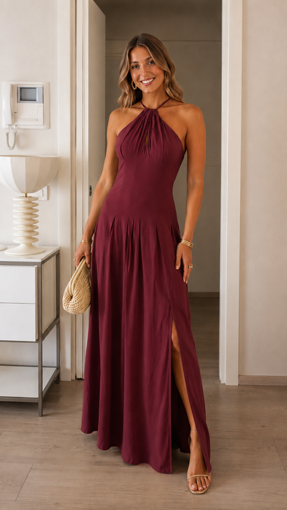 Burgundy halter neck maxi dress with gathered neckline and flowing hem