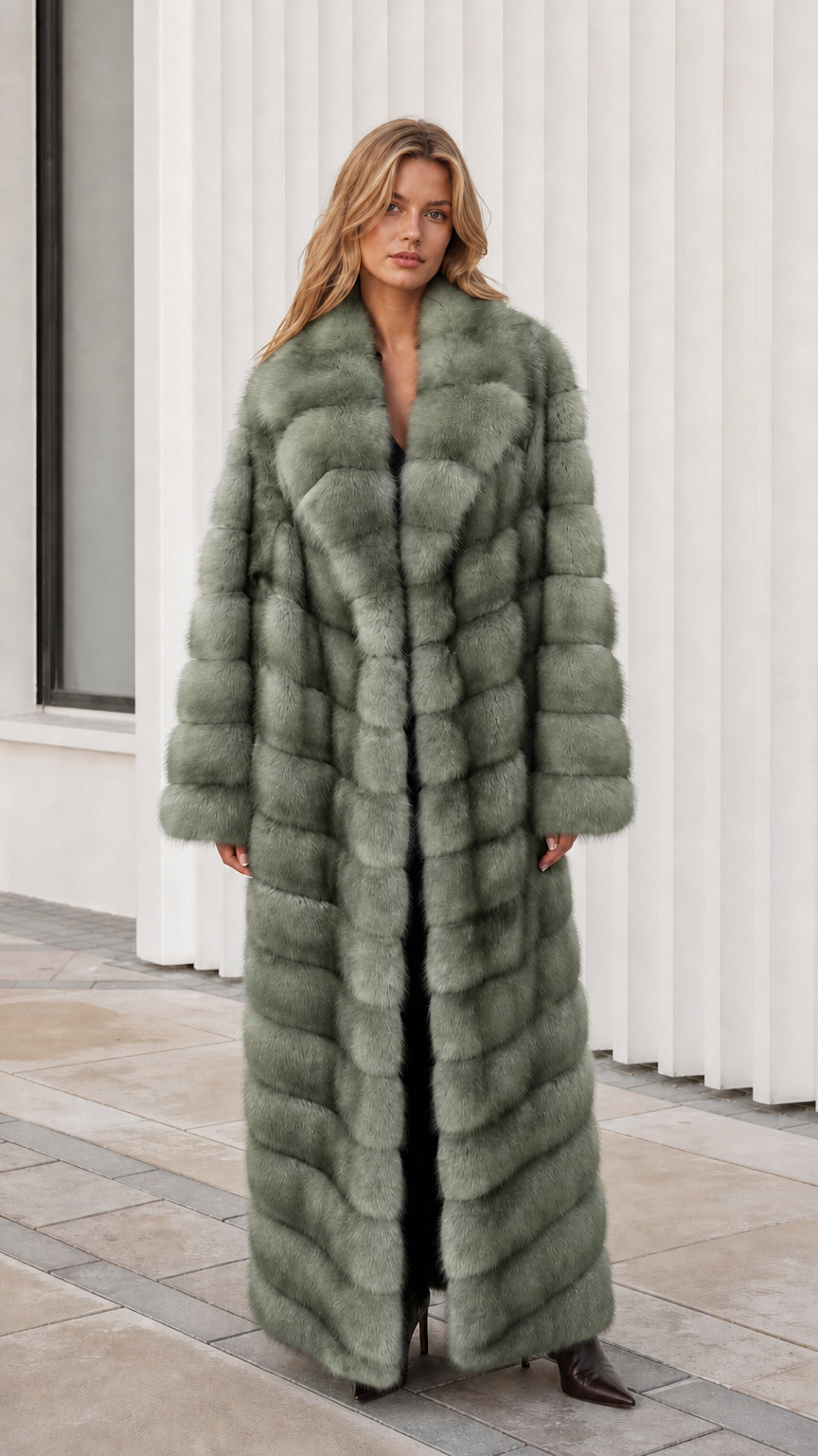 Front view of model wearing sage green full-length faux fur maxi coat