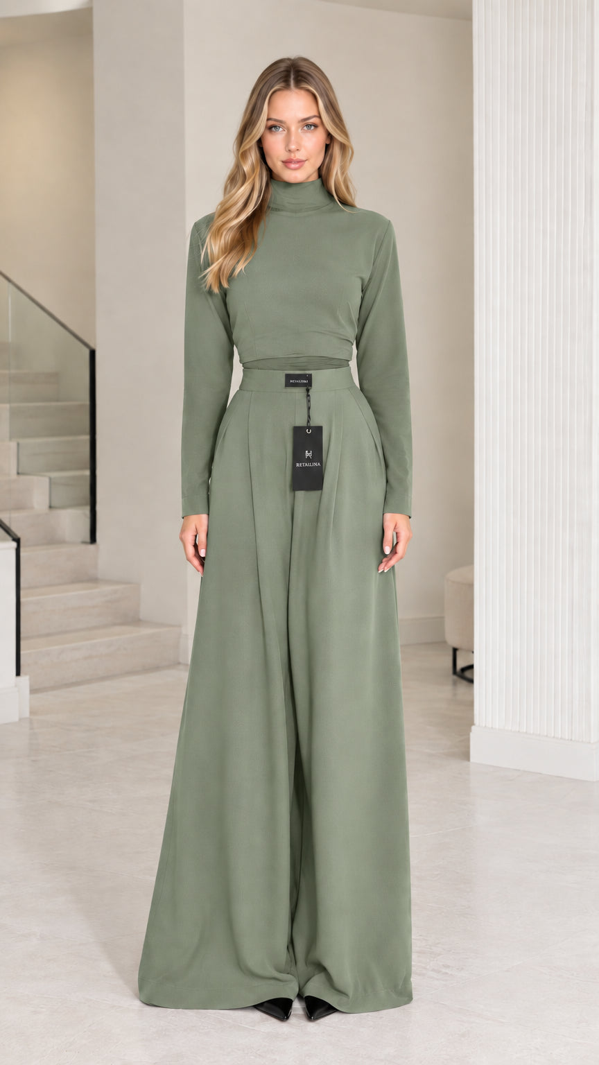 Front view of model wearing sage green mock neck top and high-waisted wide-leg pants set