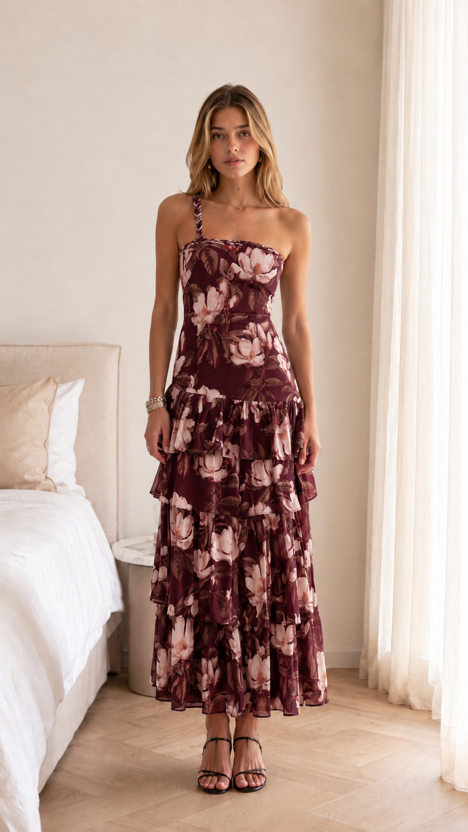 Front view of burgundy floral one-shoulder tiered maxi dress