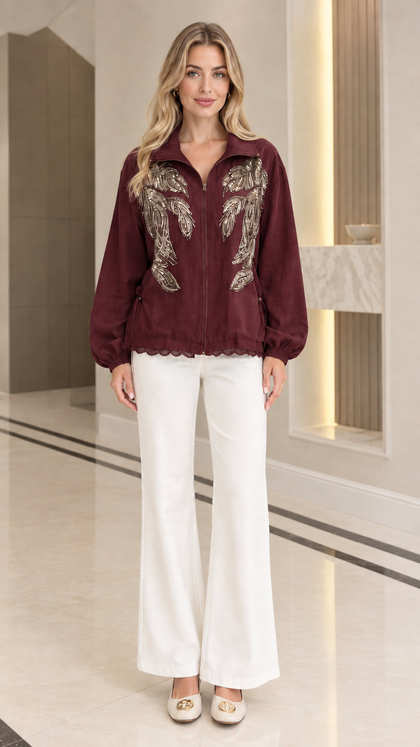 Front full-length view of woman wearing burgundy sequin embroidered zip jacket