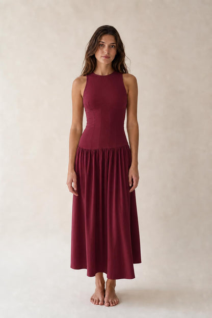 Front view of woman wearing Burgundy sleeveless midi dress