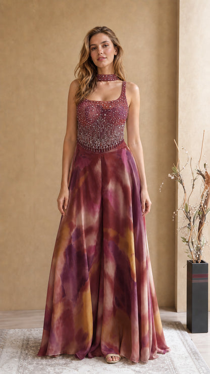 Model wearing Wine Multi burgundy tie-dye beaded evening jumpsuit