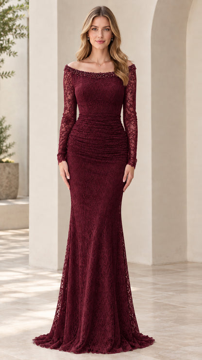 Front view of woman wearing burgundy wine lace mermaid evening gown with beaded neckline