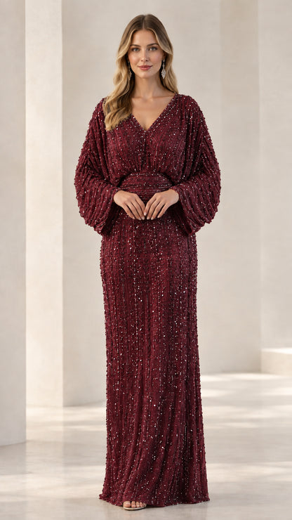 Model wearing Burgundy red beaded long sleeve evening gown
